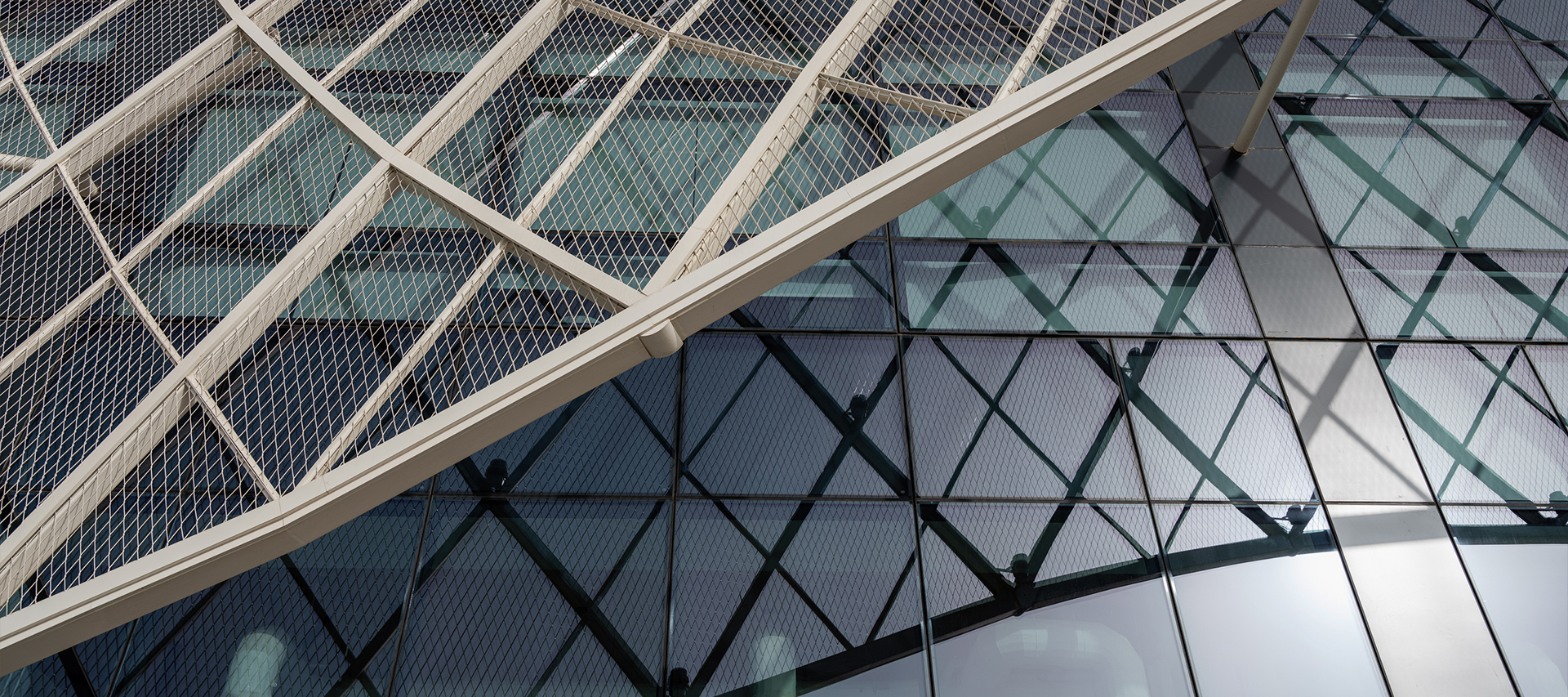 Modern architecture glass roof with curved design of steel structure