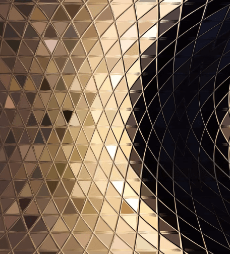 Metallic mosaic reflecting golden lights 