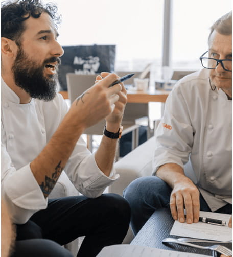 Two chefs having a conversation